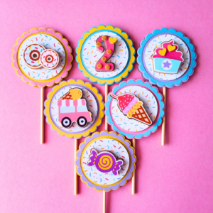 Two Sweet theme cupcake toppers featuring pastel-colored ice cream, donut, and cupcake designs with glitter accents for a second birthday party.
