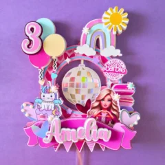 Unicorns,macarons, rainbow, disco ball, barbie all in one mixture caketopper. Sparkly embellished with pearls.. Custom made personalized with name and age.