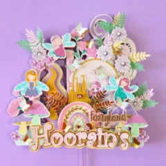 Fairies, rainbow, custom made pastel colored personalized with name of baby girl embellished with pearls for fairy theme birthday cake